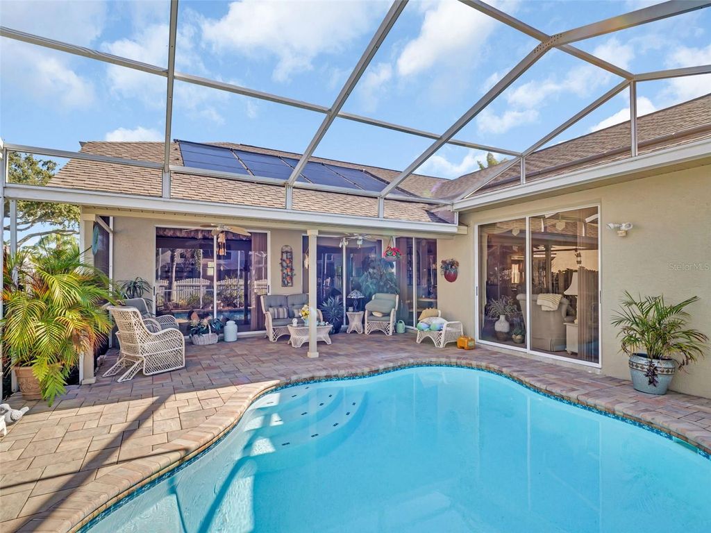 Photo of 1929 Wood Haven Street, Tarpon Springs, FL 34689 (MLS # TB8452799)