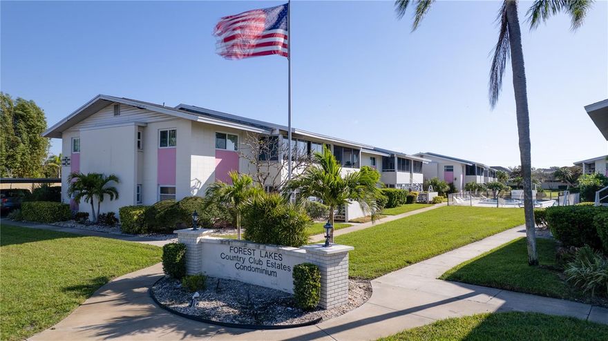 Discover Your Perfect Home at Forest Lakes Country Club Estates! Step into this charming 2-bedroom, 2-bathroom ground-floor condo, complete with a spacious porch and 2 covered parking spaces. As you enter, you'll be greeted by a cozy great room that opens to the dining and family/living room, offering a seamless flow for entertaining or relaxing. The kitchen has granite countertops. The master bath has been tastefully updated with new ceramic tile flooring. Enjoy your morning coffee or unwind in the evenings on your large back porch, which overlooks the serene 8-foot deep community pool. Ideally located, you're just minutes away from the world-renowned Siesta Key and Lido Key beaches, with the Legacy Trail just a short stroll from your doorstep. Also, you are close to vibrant bars, shops, and restaurants. This condo offers the perfect blend of comfort, convenience, and lifestyle. Don’t miss out on this fantastic opportunity – schedule a tour today!
