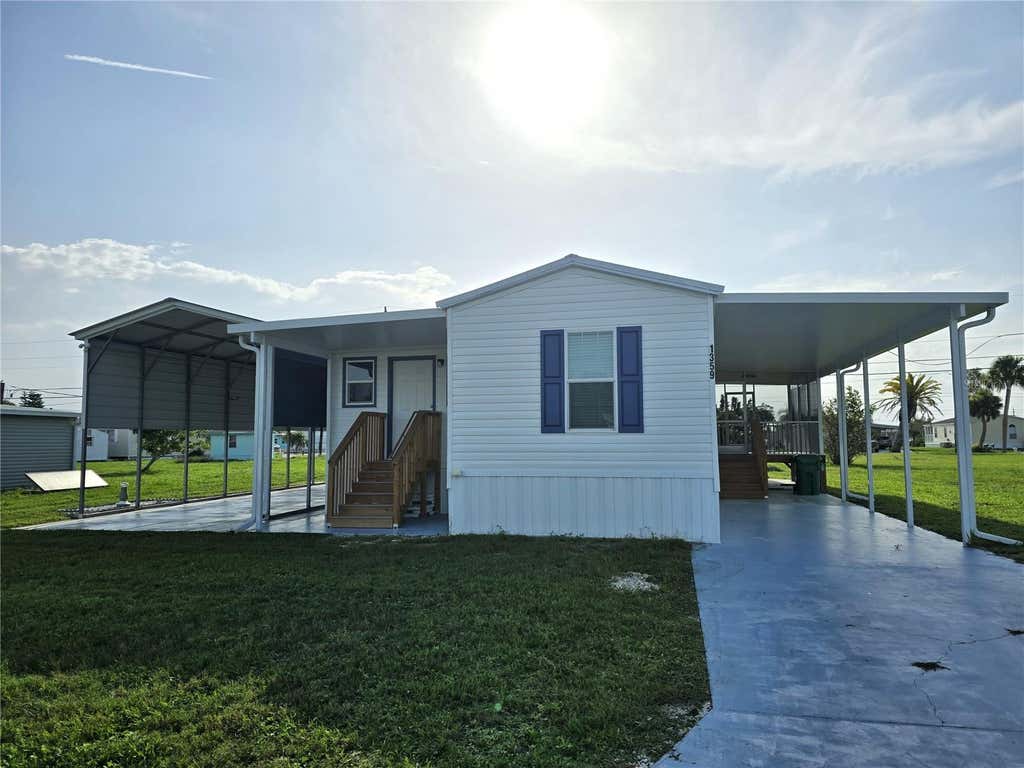 Photo of 1359 Ibis Drive, Englewood, FL 34224 (MLS # D6148069)