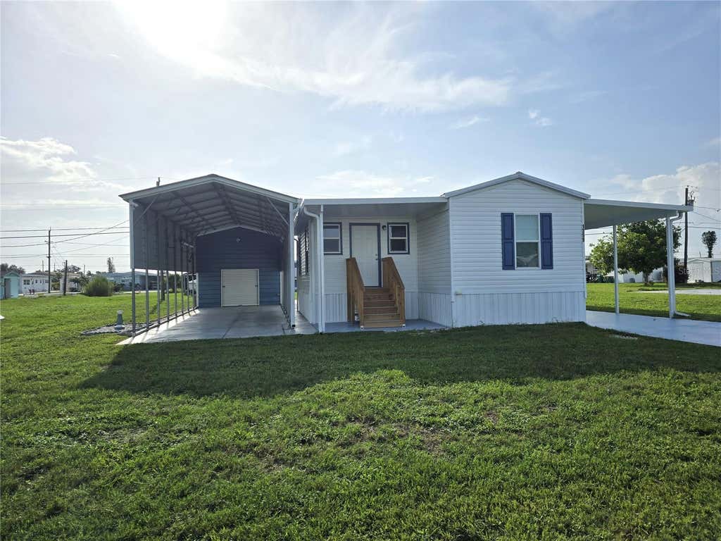 Photo of 1359 Ibis Drive, Englewood, FL 34224 (MLS # D6148069)