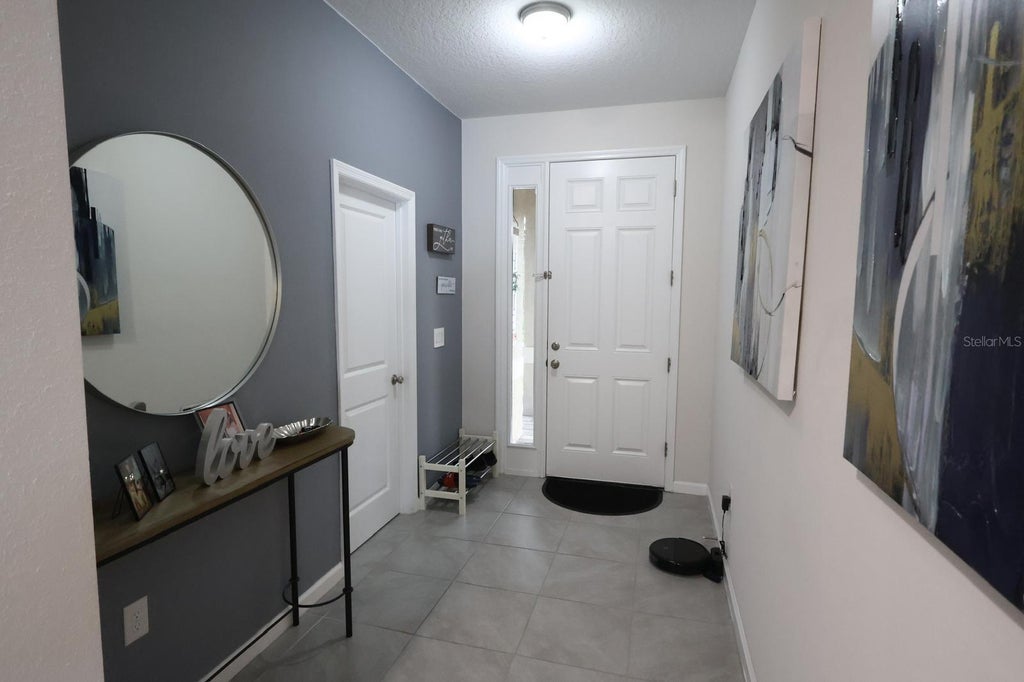 Photo of 301 Golden Sands Circle, Davenport, FL 33837 (MLS # O6441679)