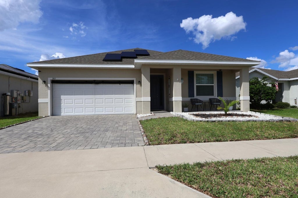 Photo of 301 Golden Sands Circle, Davenport, FL 33837 (MLS # O6441679)