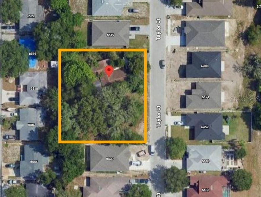 BUILDER / INVESTOR SPECIAL... 3 LOTS NEAR DOWNTOWN NEW PORT RICHEY... Here’s the opportunity everyone asks for and almost never finds. 6515 Taylor Ct sits on three lots totaling just over a half-acre (approx. 0.51 ac per public record) at the end of a quiet street, just minutes from New Port Richey’s revitalized riverfront downtown.

The existing mid-century home (original structure c.1952 with a major addition around 1989) has fallen into disrepair and is being marketed primarily for land value. It will likely be best suited for a full renovation pro or, more powerfully, as a tear-down to make way for new construction. With three lots to work with, imagine a small enclave of new single-family homes, or a pair of larger custom residences with generous yards.

What makes this play so attractive is the location. You’re a short drive to Historic Downtown New Port Richey and the Cotee River “Main Street” district, where a walkable mix of local restaurants, rooftop and sidewalk bars, cafés and breweries keeps the area buzzing day and night while still feeling like a small coastal town.

Residents and visitors flock to Sims Park on the river for its playground, splash pad, amphitheater and regular concerts, movie nights and festivals. Plus, the famous Chasco Fiesta and the Cotee River Christmas Boat Parade that light up the waterfront each year!

Outdoor lovers will appreciate quick access to James E. Grey Preserve and Jay B. Starkey Wilderness Park for hiking, biking and wildlife, as well as nearby Green Key/Robert K. Rees Memorial Beach for sunset over the Gulf.

Bring your architect, your builder and your vision. Opportunities to control three lots this close to a vibrant, growing downtown river district don’t come along often; especially at a price where the numbers can make sense on multiple exit strategies. Buyers to perform all due diligence; home has significant deferred maintenance and will be sold in its current condition. No creative/seller financing available, please bring serious offers only.