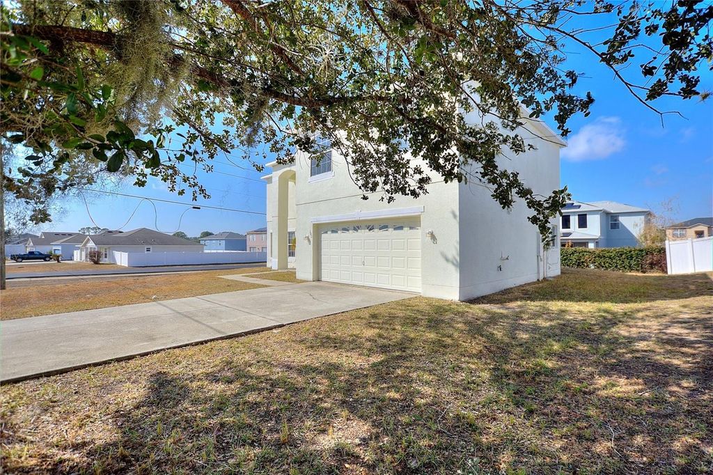 Photo of 101 Big Black Dr, Poinciana, FL 34759 (MLS # S5143370)