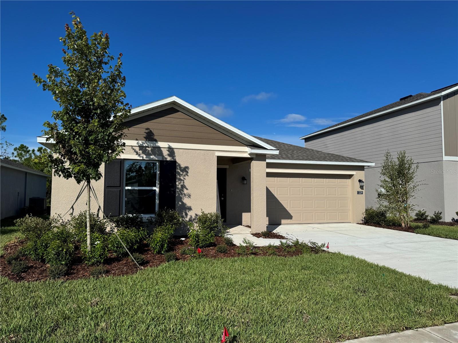 3 BR 2 BA 1,487 SQ/FT 1 ONE STORY SINGLE FAMILY HOME Located in the desirable city of Daytona Beach, LPGA Preserve by Lennar is a beautifully designed master-planned community that blends modern living with Florida’s natural beauty. Residents enjoy access to top-rated public schools, scenic coastal beaches, and a wide array of dining, shopping, and entertainment options. Just minutes from major attractions such as the Daytona International Speedway, Daytona Boardwalk, and world-famous beaches, this community is also adjacent to LPGA International Golf Club, offering two championship golf courses and state-of-the-art practice facilities. Nestled among lush wetland preserves, this property comes fully equipped with brand-new stainless steel appliances, a full-size washer and dryer, modern windows, elegant tile flooring throughout the common areas, and cozy carpeted bedrooms for added comfort.