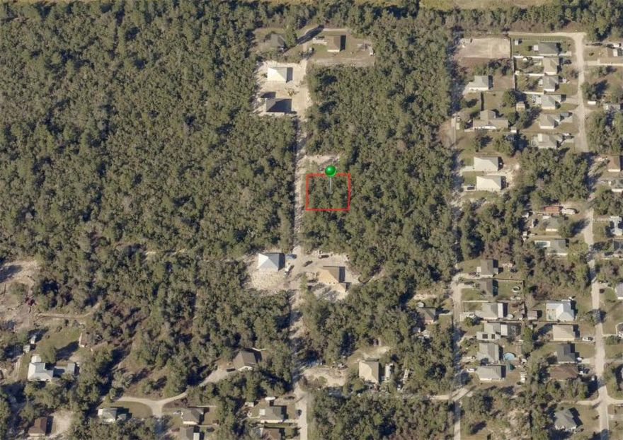 BUILDING LOT, 125ft x 100ft. Excellent location, rural feeling but with convenient location.  Near the St. Johns River, Blue Springs Park, and the Spring-to-spring bike trails. No time limit to build and use the builder of your choice! NO FLOOD ZONE