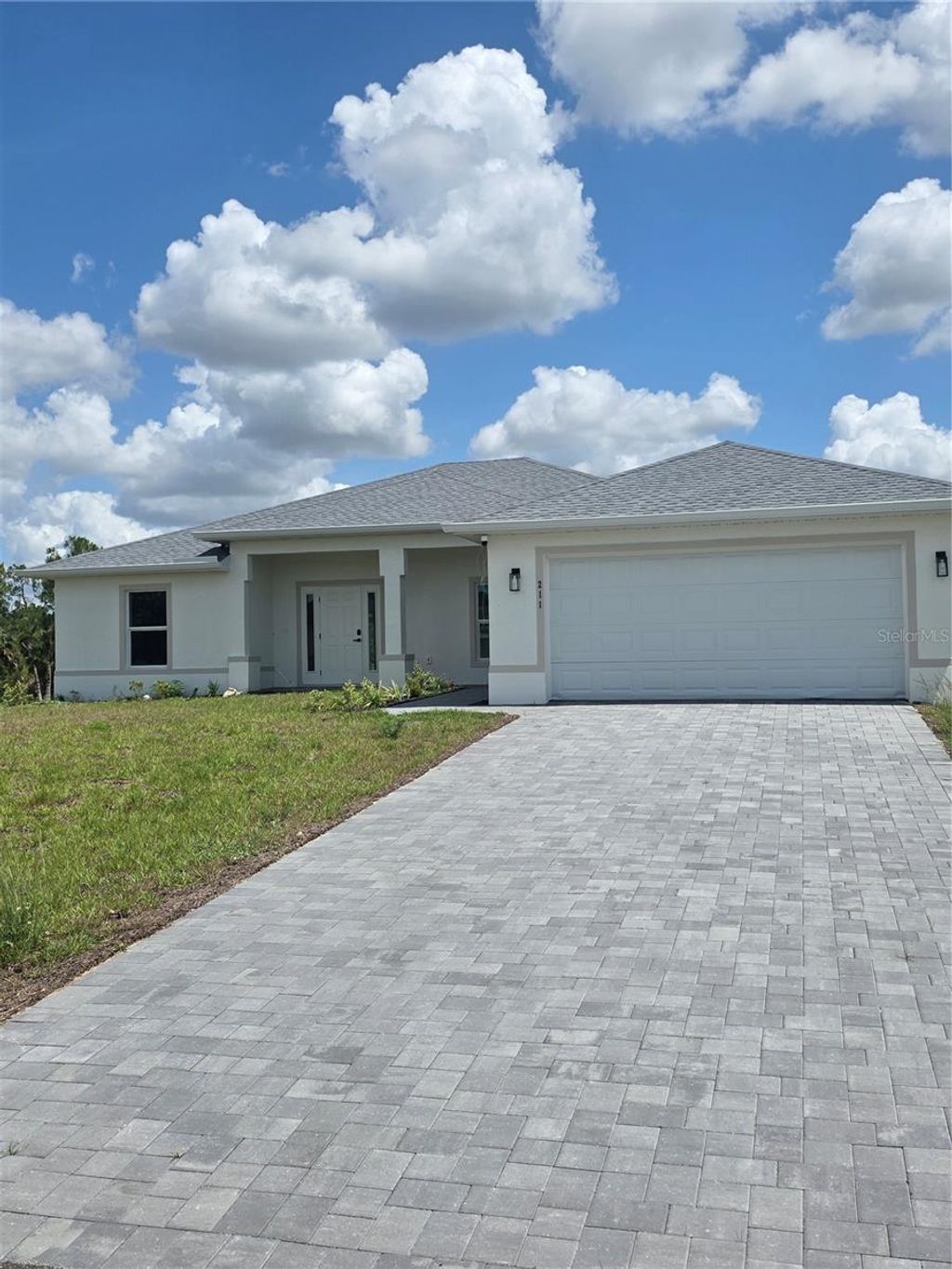 Photo of 211 NE 31st Street, Cape Coral, FL 33909 (MLS # TB8510367)