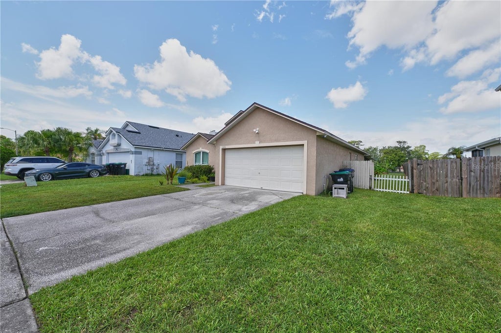 Photo of 2486 Island Club Way, Orlando, FL 32822 (MLS # O6426479)