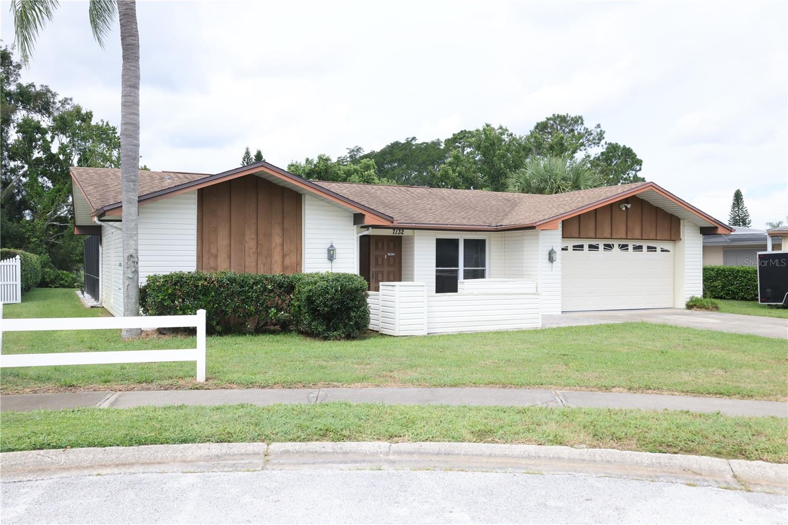 Nestled on a quiet cul-de-sac in the heart of Port Richey, this 3-bedroom, 3-bath, 2-car garage pool home offers the perfect blend of comfort, functionality, and Florida lifestyle. Situated on a HUGE .35-acre lot with backyard water access and a private dock ideal for fishing, this property boasts a split-bedroom layout, newer windows, and laminate flooring throughout. The open-concept kitchen and living room create an inviting atmosphere, while the kitchen’s passthrough window and outdoor bar in the lanai make entertaining a breeze. The versatile third bathroom can be closed off to serve as a convenient pool bath. Enjoy sunny afternoons in the sparkling in-ground pool or explore nearby parks, beaches, shopping, dining, and entertainment. Don’t miss your chance to own this rare waterfront gem—schedule your private showing today! This home is available for the next three days only to Active-Duty Military, Veterans, Widows of Veterans Educators & First Responders. See the attachment for more information on our Special Give Back Program and how to qualify.