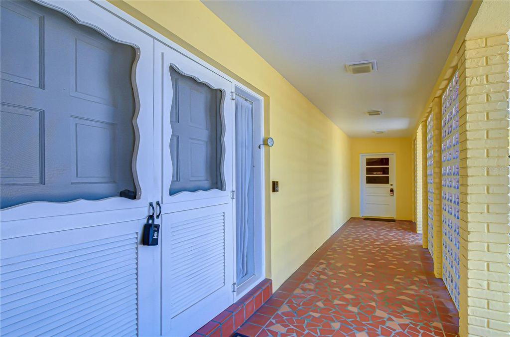 Photo of 9625 Commodore Drive, Seminole, FL 33776 (MLS # TB8502111)