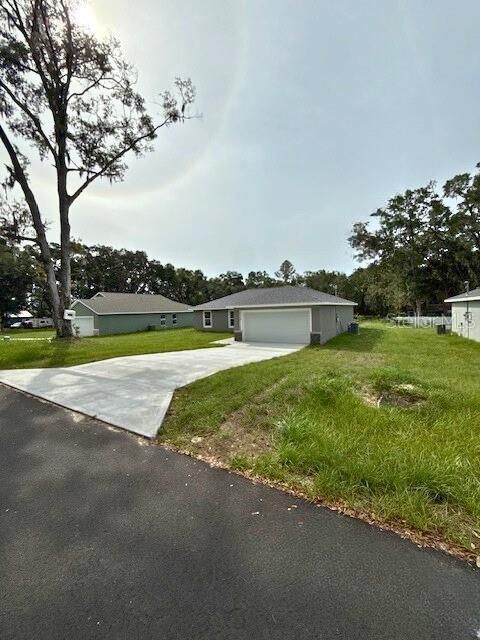 Photo of 17574 SW 112th Place, Dunnellon, FL 34432 (MLS # OM708560)