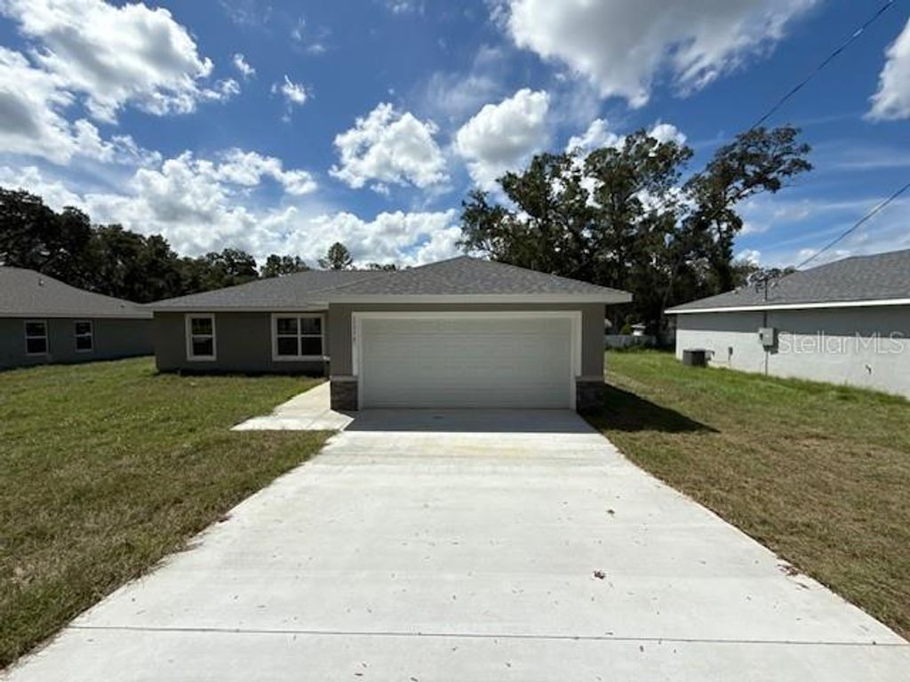 Photo of 17574 SW 112th Place, Dunnellon, FL 34432 (MLS # OM708560)