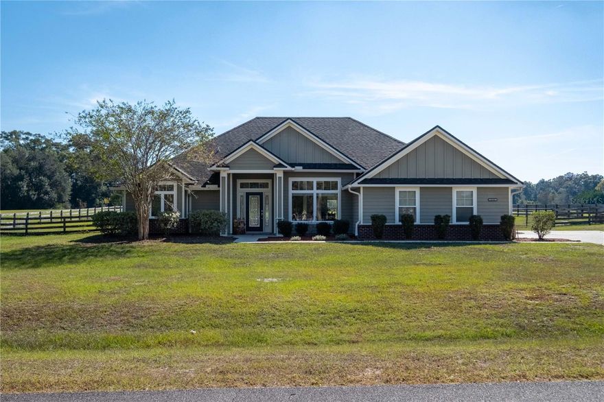 Welcome to the peace and quiet of Cinnamon Hills Estates! This move-in ready, 3/2 home was built in 2014 and is situated on just over an acre. Inside, you'll find tall ceilings and open concept living with tons of natural light. Formal dining room off kitchen and breakfast nook both opening to the kitchen. The great room is large enough for a huge couch and right by your back porch and extended paver patio. Wood, laminate & tile flooring throughout (no carpet). Indoor laundry room has a folding counter, upgraded cabinetry, wash tub, and washer and dryer that stay.  A generous kitchen with granite counters and stainless-steel appliances perfect for cooking and entertaining. Elegant tray ceilings in both the living room and master bedroom and crown molding throughout. The primary suite has large closet space, a luxurious garden tub and a separate standing shower. Outside, the property boasts an irrigation system, gutters and downspouts, a charming paver patio area ideal for stargazing, a fully fenced yard, and the promise of a breathtaking sunset that could only exist in your dreams. Outside AC unit was replaced in 2022, adding to the comfort and convenience of the home. Plus, you'll relish the convenience of being just minutes away from Poe, Blue, and Ginnie Springs – and still only a short commute to Gainesville. All of this on top of being zoned for exceptional schools in a neighborhood offering community playground!