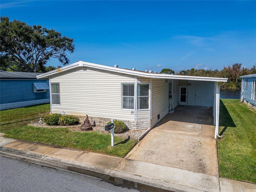 Photo of 1001 Starkey Road, Lot#355 Rd, Largo, FL 33771 (MLS # TB8450627)