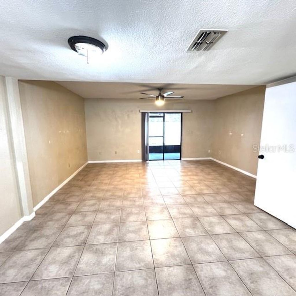 Photo of 10128 Lake Oak Circle, Tampa, FL 33624 (MLS # TB8504311)