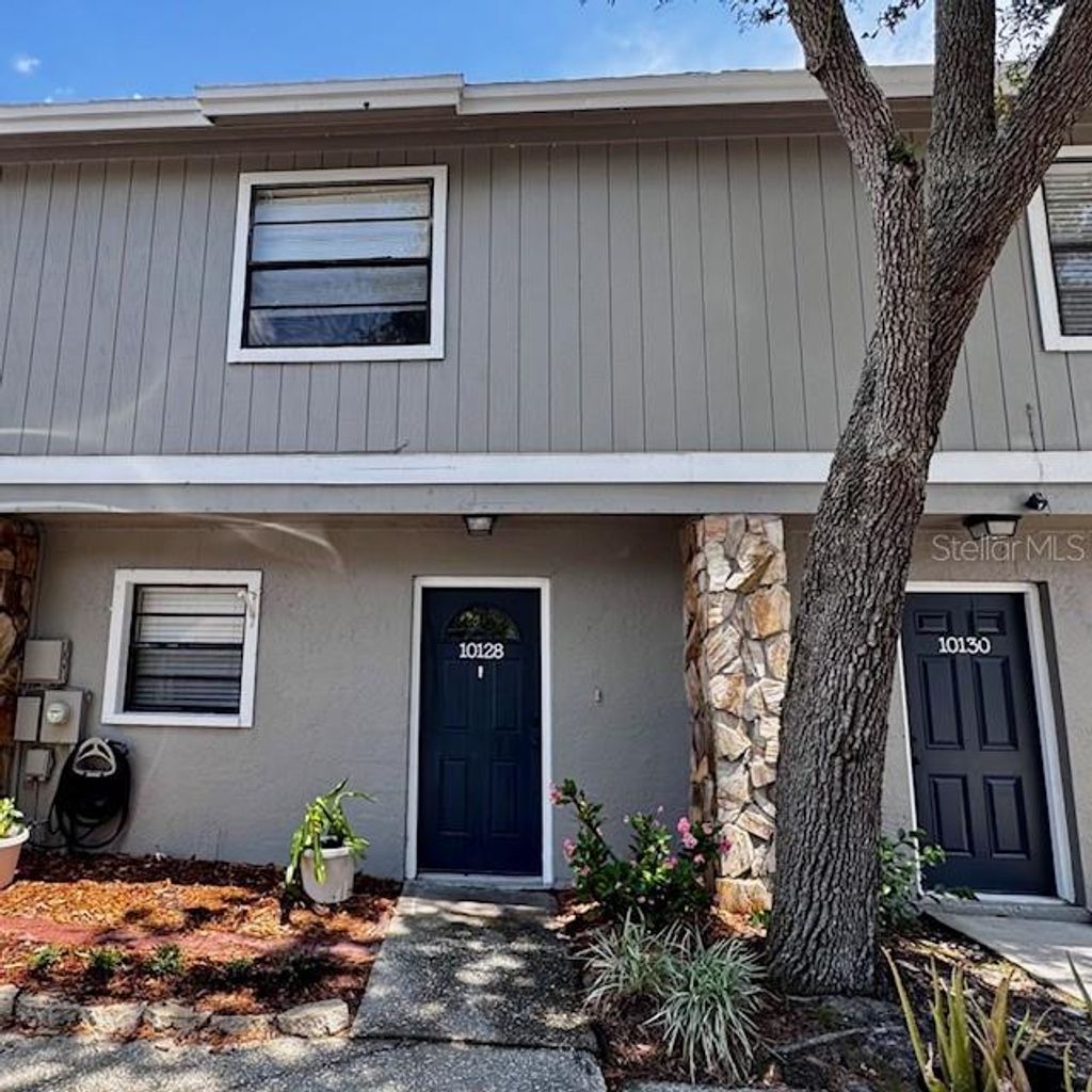 Photo of 10128 Lake Oak Circle, Tampa, FL 33624 (MLS # TB8504311)
