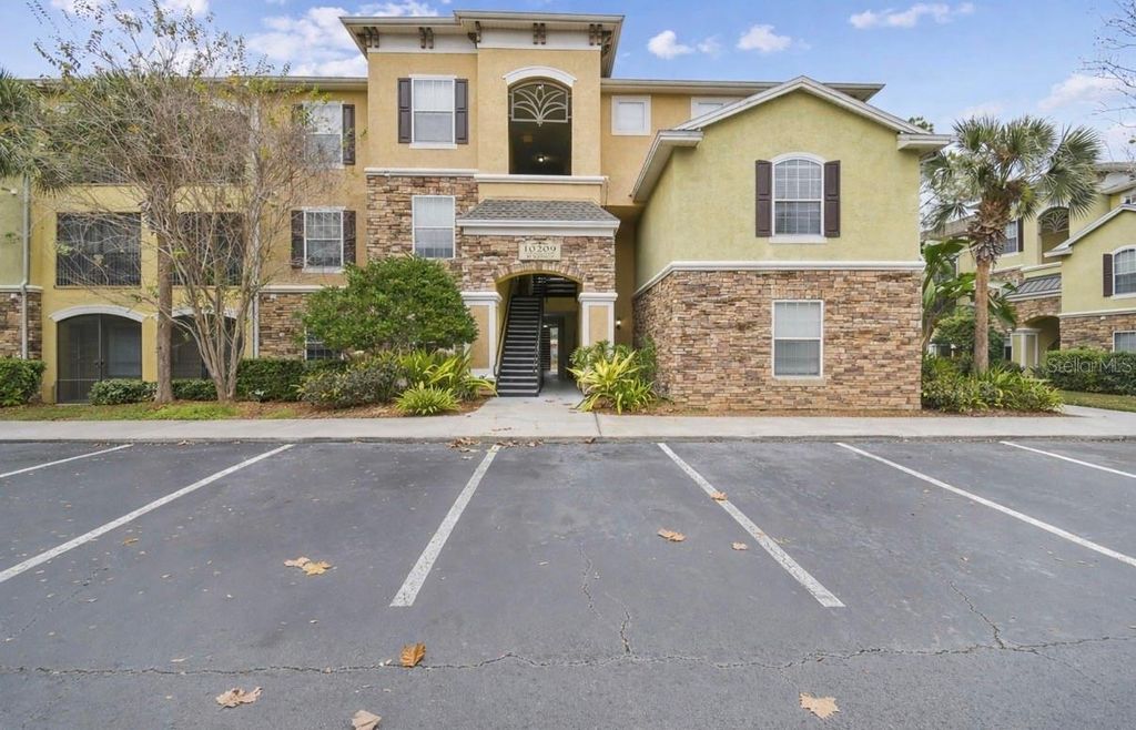 Photo of 10209 Courtney Palms Boulevard #101, Tampa, FL 33619 (MLS # TB8465611)