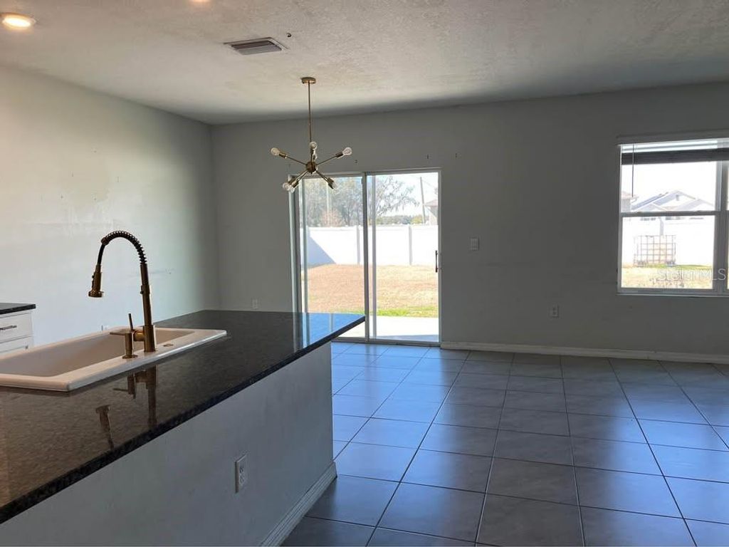 Photo of 1703 Johnson Pointe Drive, Plant City, FL 33566 (MLS # TB8472648)