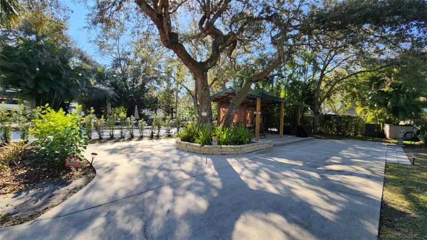 Welcome to your new RV RESORT Home away from Home in CENTRAL FLORIDA!  Enjoy the beauty and elegance of River Ranch RV Resort with this gorgeous RV Lot! Camp RAIN or SHINE with this oversized Pavilion covering! This privately owned RV lot is located in Phase 2 and offers EXCELLENT SHADE, beautiful landscaping, a large pavilion w/ electric, a cozy firepit area, a grassy area, storage shed and privacy with pull down shades! The space also offers extra parking options and is walking distance to the pool, laundry, bathhouse and clubhouse!  This resort is located on the Kissimmee River with direct access to Lake Kissimmee! The HOA is $875/every 3 months and includes, water, sewer, trash, cable, manager, amenities and lawn. Lot Size 40x69.  Lot is currently in Resort Rental Program generating income! River Ranch RV Resort is perfect for weekend vacations, family camping, seasonal living! River Ranch RV Resort offers beautiful landscaping and privately owned RV lots.  There are many amenities such as Pools, Tennis, Pickle Ball, Clubhouse, Social Events, Billiards, Poker Room and more!  The Resort sits adjacent to Westgate River Ranch Resort and Rodeo with MANY fun things to do for everyone! For starters, there is a LIVE Rodeo every Saturday night – an excellent display of showmanship and fun for the entire family! There is even a Saloon (family friendly), with LIVE bands, DJs, dance parties and they give line dancing lessons for free.  There is an adventure park which has a bounce house, mechanical bull, climbing tower, Arcade, mini golf, outside movie on the greens, bicycle rentals, airboat rides, river boat rides, swamp buggy, hayrides, petting farm, trap & skeet range and a bow target for shooting. There are several places to eat on property.  The River Ranch Chop House serves delicious food and drinks, a waterfront Smokehouse Grill serves delicious BBQ, a pizza shop and an ice cream and coffee shop (serving Starbucks.) There is also a General store and a Western store to grab all of your favorite Cowboy/Cowgirl finds! Watch the Bison, Steers, Horses and other wildlife!  Don’t forget to check out the Petting Farm!!