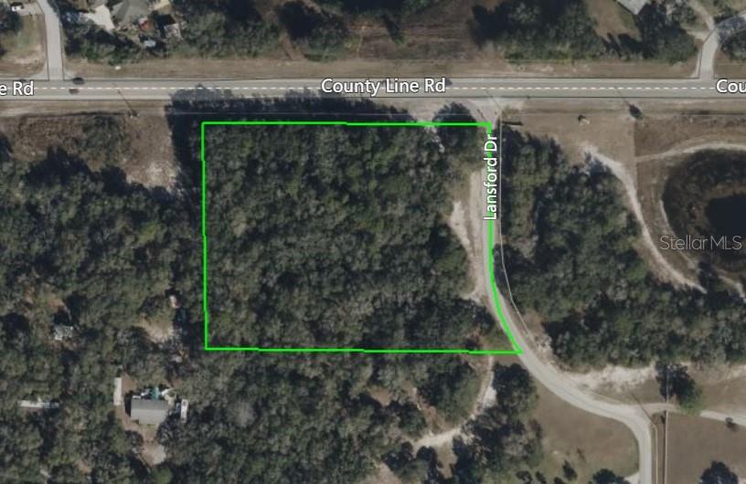 3.43± Acres of vacant land in Hudson, Florida, along Countyline Road, at the southwest corner of Lansford Drive. Just a short drive of approximately 2.9 miles east from US 19. Current zoning would allow up to potentially 6 residential units. Central water is already available to the site, with Pasco County water lines running along the southern side of Countyline Road.