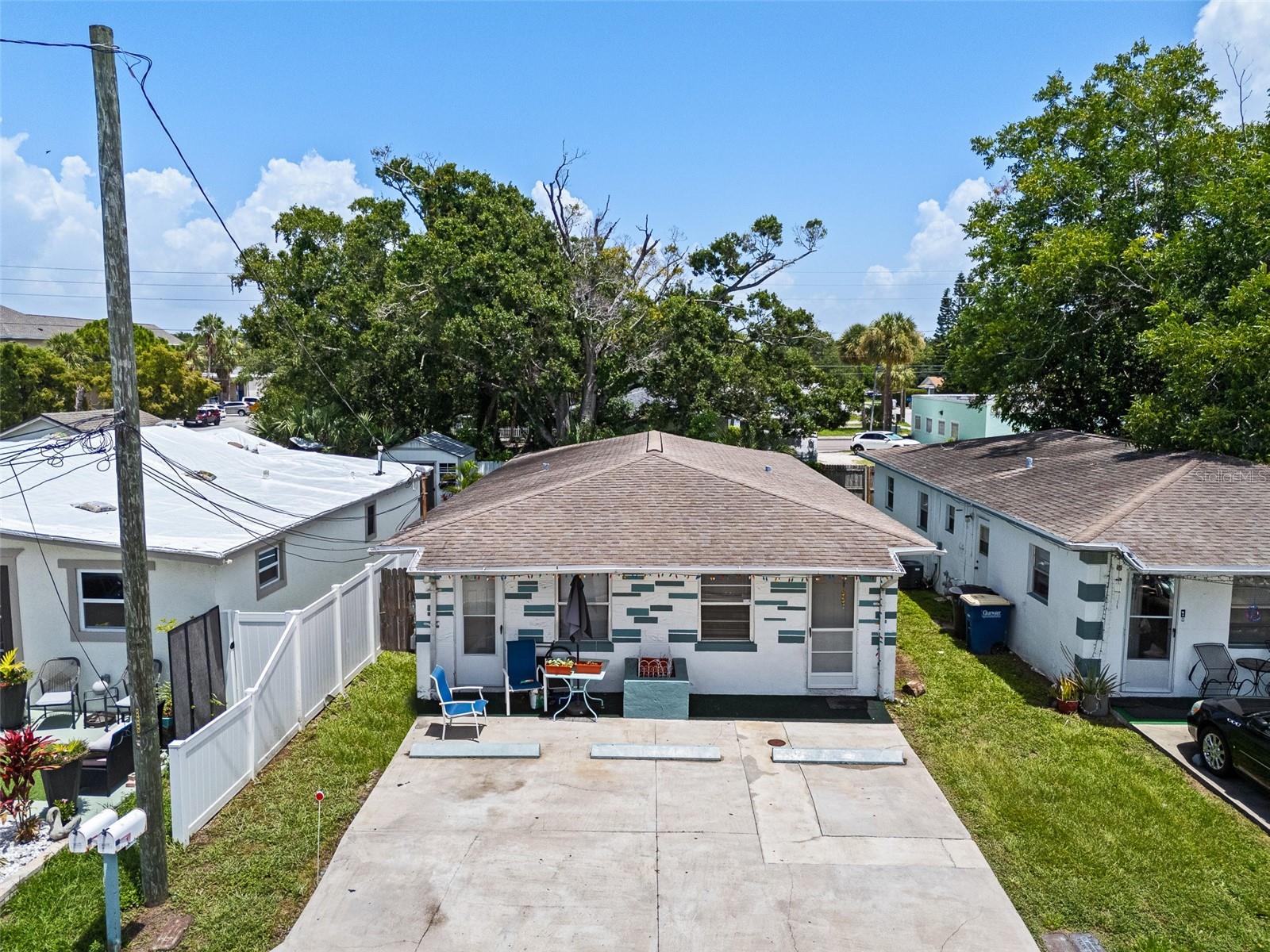 A rare all-block duplex sits on a solid slab foundation and is not located in a flood zone—a rare advantage in Florida. Even better, the property has never experienced flooding or wind damage from past storms or hurricanes, giving you peace of mind for years to come.
Each unit offers 2 bedrooms and 1 bathroom, complete with its own washer and dryer, plus separate water and electric meters for easy utility management. The fenced backyard offers privacy and outdoor space on both sides.
Perfectly positioned in a walkable neighborhood, the property is just steps from nearby parks, the local library, and other community amenities (several shown in the listing photos). This highly desirable location blends convenience with lifestyle appeal, making it attractive for both residents and future tenants.
With market rents in the $1,400–$1,500 range per side, this property delivers strong rental potential. Whether you’re an investor seeking solid returns or a buyer looking to live in one unit while renting the other, this duplex offers a smart and versatile opportunity.