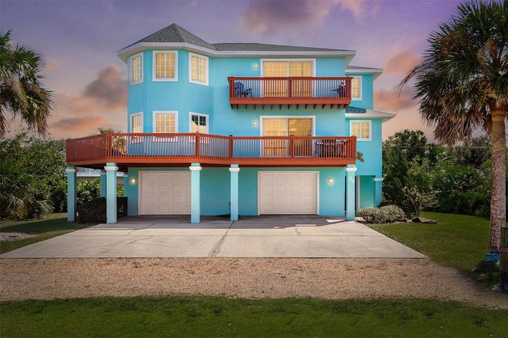 Photo of 34 Oceanside Drive, Palm Coast, FL 32137 (MLS # FC313324)