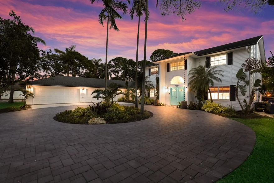 OVER $487,000+ IN GROSS RENT FOR 2023!!! UNREAL RENTAL RETURN ON INVESTMENT! You simply wont find another property that cash flows like this one!!! Welcome to Xanadu - a stunning turn-key furnished luxury estate on 2.3 acres in NW Bradenton currently used as an established and lucrative vacation rental property!!! BRAND NEW JUST ADDED PICKELBALL COURT AND FULL SIZE PROFESSIONAL SAND VOLLEYBALL COURT!!! This impressive 8 bedroom, 4.5 bathroom home boasts a resort-like tropical outdoor oasis with a private beach and lavish swimming pool. With two separate homes on property, there’s more than enough room for multiple parties to live or stay comfortably. Showcased with modern design and steeped with coastal elegance, this unique estate will captivate you from the moment you set foot on property. No expense has been spared to transform this extravagant home, and every inch has been recently renovated with the finest materials and finishes. A circular drive leads to the main home which plays host to 5 spacious bedrooms and 3.5 spa-inspired bathrooms with 2 side-entry garages to accommodate 5 vehicles. A gourmet kitchen features shaker-style cabinets, tongue-in-groove ceiling, solid quartz countertops with waterfall island, two designer pendants, and slide-in range to elevate your culinary experience. The kitchen provides plenty of seating with two counter-height bar seating areas and an adjacent kitchen nook. An entertainer’s dream, gather friends and family in the formal family room with a cozy fireplace, or the bonus room at the front of the home. This large room could be a formal dining room, billiards/game room, and more, and offers a charming window seat for a bright reading spot. The second building, situated just behind the pool area, features over 1,000 square feet of living space and includes 3 bedrooms, full kitchen, full bathroom, and living area. The true showstopper of the estate is the slice of paradise behind the main home. Surrounded by lush landscaping and towering palms, this secluded, tranquil haven makes the perfect spot for ultimate relaxation with an L-shaped resort-style pool where you can lounge on the sun shelf with bubblers, its very own beach, and an oversized, covered lanai. Dine alfresco by the pool and enjoy the ambience provided by the fire bowl accents. If the private beach isn’t enough for you, drive just 9 minutes to reach the beautiful white sandy beaches of the Gulf Coast. Opportunities are endless in this gorgeous property: make the main home yours and use the second as an investment property, take advantage of both for yourself, or offer both as a vacation rental! Claim this rare gem as your own and schedule your private showing today!