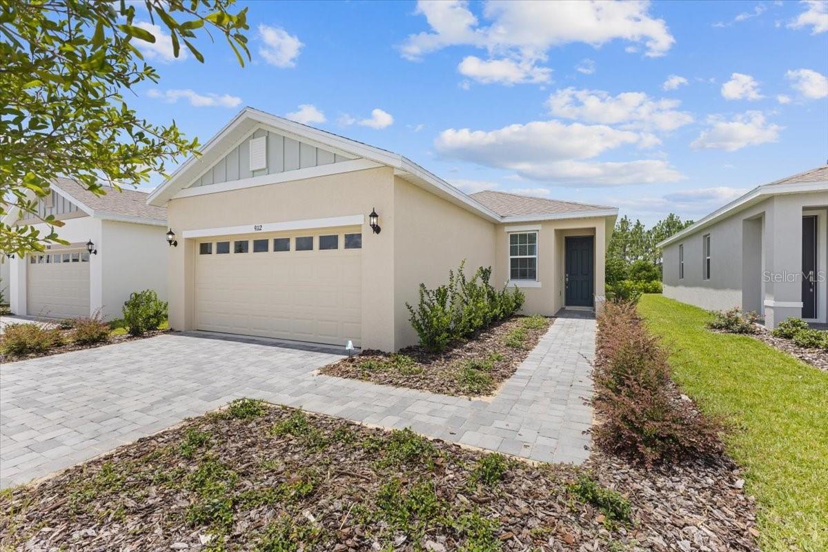 New floorplan! Welcome to the Delight, a spacious open plan with 3 bedrooms and 2 bathrooms. Key features include 9’4” ceilings, 17" x 17" ceramic tile that flows throughout all living areas and a sliding glass door welcoming you to a lanai. The kitchen features ample cabinetry with 42” upper cabinets for extra storage, a spacious island with sink and quartz countertops. Stainless steel appliances include a microwave over the range, dishwasher and side by side refrigerator. Retreat to the private master suite featuring dual vanities and a large walk-in closet. Every home comes with blinds on the windows and a SMART home technology package. The Delight stands out with its forward-thinking design as the home can grow with you.