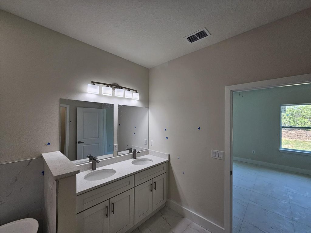 Photo of 2310 Logsdon Street, North Port, FL 34287 (MLS # O6299680)