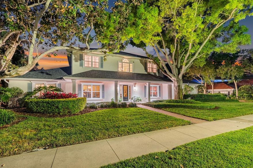 This exceptional residence offers a rare opportunity to acquire one of Belleair’s most prominent addresses. Located at 445 Park Avenue, this estate-sized property is one of only a select few positioned with convenient access to both the Pelican Golf Club and the Belleair Country Club.

Spanning approximately 5,748 square feet, the home features six bedrooms, four full bathrooms, and two half baths, including a dedicated pool bath. Designed for both large-scale entertaining and comfortable everyday living, the floor plan offers expansive open gathering spaces balanced by a split-bedroom layout that provides privacy for family and guests alike.

The main living area serves as the heart of the home, featuring beautiful wood flooring and generous spaces designed to bring people together. The chef’s kitchen combines exceptional storage, distinctive custom cabinetry, tumbled marble countertops, and a large center island with informal seating and abundant prep space, creating an ideal setting for everything from casual family meals to holiday gatherings.

The primary suite offers the feel of a private retreat, complete with an oversized walk-in closet and a newly renovated bath featuring a jetted soaking tub, oversized shower, dual vanities, and a dedicated cosmetics station. Additional flexible living spaces include a first-floor guest suite, private office, and a separate area well suited for an in-law or extended family arrangement.

Outdoors, beautifully landscaped grounds surround a sparkling pool and spa, while covered seating areas and a well-appointed outdoor kitchen create the perfect environment for year-round entertaining and al fresco dining.

The attached two-car garage and separate detached two-car garage provide outstanding flexibility for storage, hobbies, recreational vehicles, or additional workspace. Above the detached garage, air-conditioned bonus space adds even more versatility to the property.

Adding to its appeal, this exceptional estate is located in a no-evacuation zone despite its close proximity to the water.

Floor plans and virtual tours are available upon request.