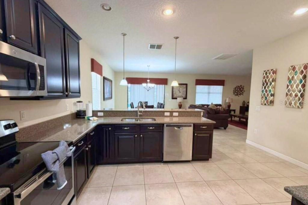Photo of 1423 Wexford Way, Davenport, FL 33896 (MLS # O6421515)