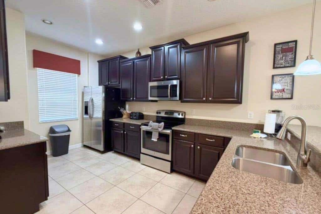 Photo of 1423 Wexford Way, Davenport, FL 33896 (MLS # O6421515)