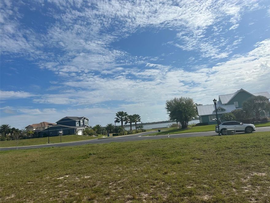 Discover the perfect canvas for your dream home at 231 Blazing Star Avenue, a premium vacant lot in the exclusive, gated Water Ridge community of Lake Alfred, FL. This cleared, build-ready lot offers serene lake proximity and access to unparalleled amenities, including three resort-style pools, two clubhouses with fitness centers, tennis and pickleball courts, private boat ramps, and scenic trails. Nestled between Tampa and Orlando with easy I-4 access, enjoy the tranquility of lakefront living just 30 minutes from Disney World, fine dining, and shopping. Surrounded by the natural beauty of Lake Alfred, Lake Van, and Lake Medora, this lot is ideal for outdoor enthusiasts and those seeking a peaceful retreat. With public utilities and high-speed internet in place, seize this rare opportunity to craft your luxury oasis in one of Central Florida’s most coveted communities. Listed at an estimated value of $89,000—your vision awaits!