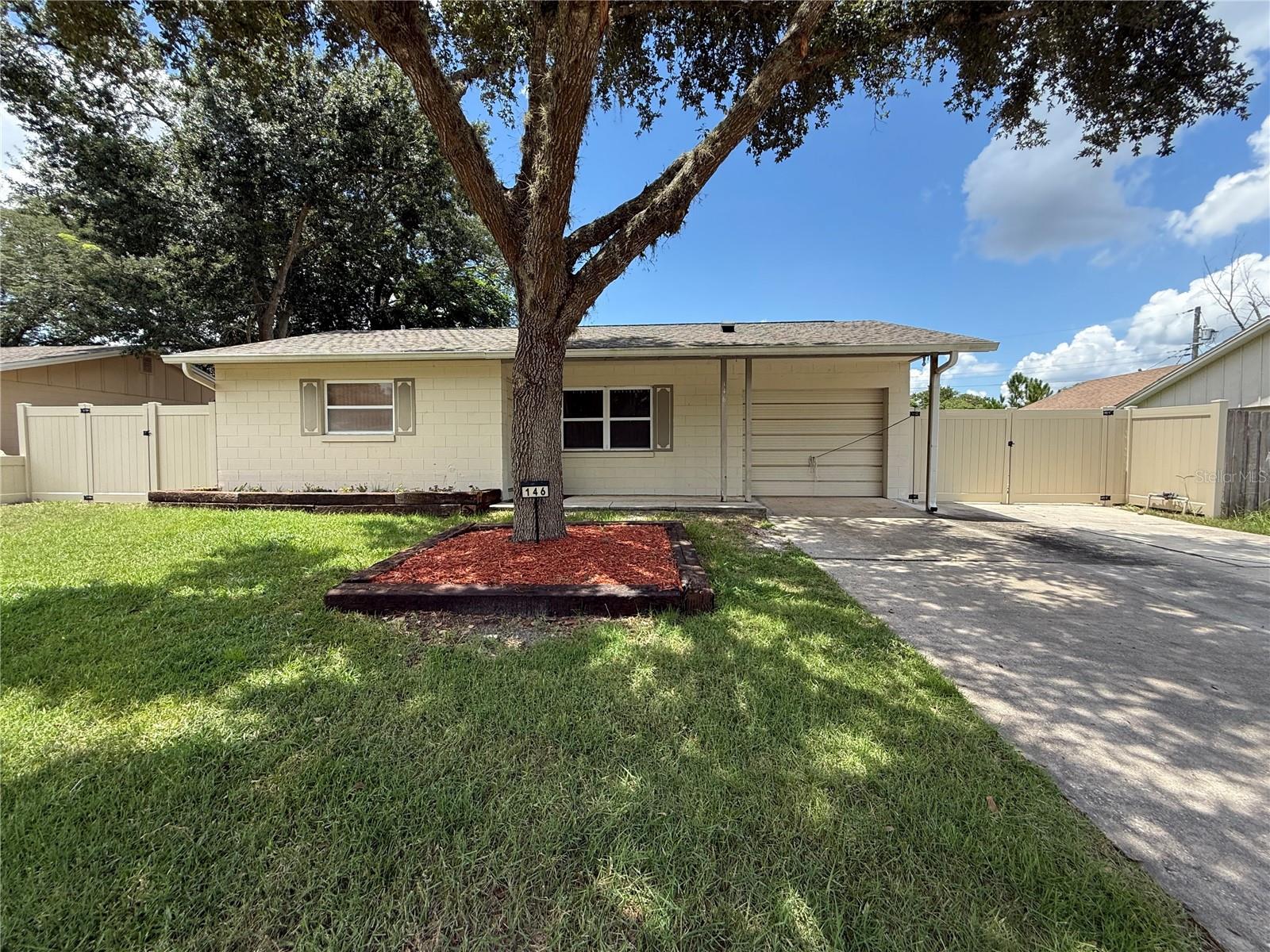 Fantastic opportunity for a first-time homebuyer or savvy investor! This home offers solid bones and several big-ticket updates already completed, just bring your vision and finishing touches to make it shine. Major improvements include a new roof (2021), new AC system (2020), new vinyl fencing (2020). Over the years, other improvements include repiping with flex piping, upgraded electrical including a meter base, riser, and wiring, and replacement of the FPE main panel. The windows have also been upgraded to double-paned glass, offering energy efficiency and added value.
The original one-car garage has been thoughtfully converted into a bonus bedroom with AC access, along with a modern half bath, perfect for guests, a home office, or additional living space. Please note, this area is not included in the heated square footage. The garage door remains in place (bolted down with rails removed), making it easy to convert back to a functional garage if desired.
Inside, the kitchen and full bathroom have seen some upgrades, while the rest of the home provides a blank canvas for your personal touches. Additional features include tandem driveway parking and extra parking space behind the fence, ideal for multiple vehicles or recreational toys.
This property is priced with remaining updates in mind and offers incredible potential in a well-established neighborhood. Don't miss the chance to turn this into your dream home or next great investment!
