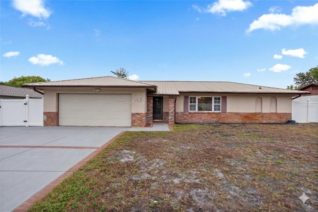 Photo of 7529 Village Green Drive, Winter Park, FL 32792 (MLS # O6396985)