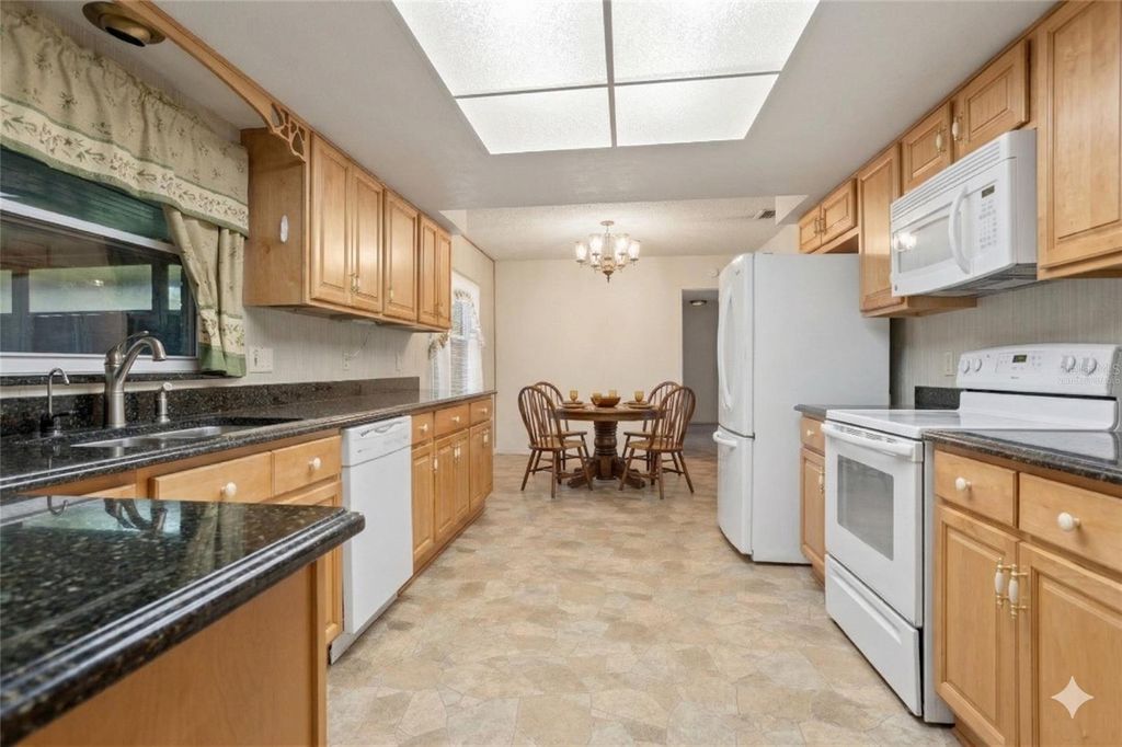 Photo of 7529 Village Green Drive, Winter Park, FL 32792 (MLS # O6396985)