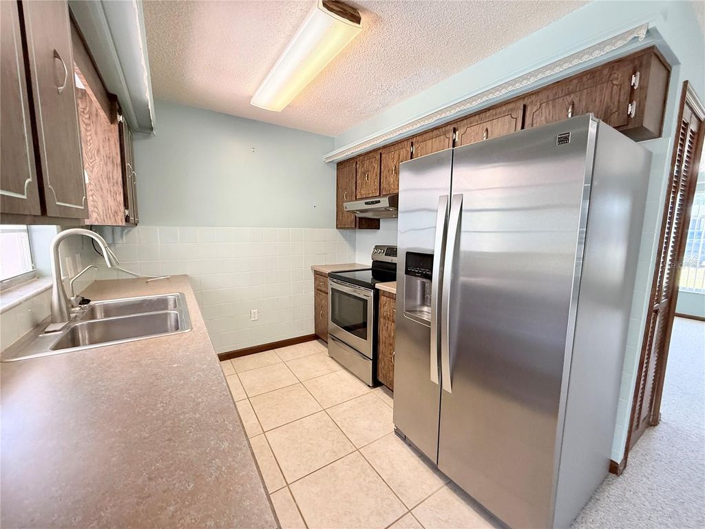 Photo of 644 N Firwood Drive, Deltona, FL 32725 (MLS # O6405011)