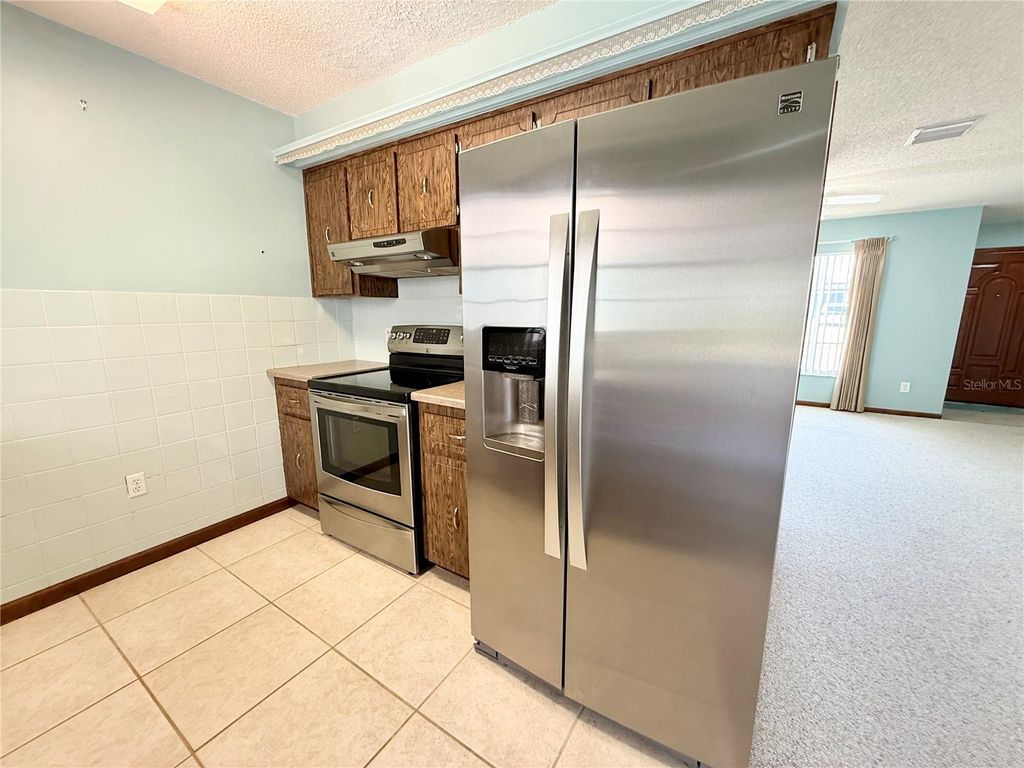 Photo of 644 N Firwood Drive, Deltona, FL 32725 (MLS # O6405011)
