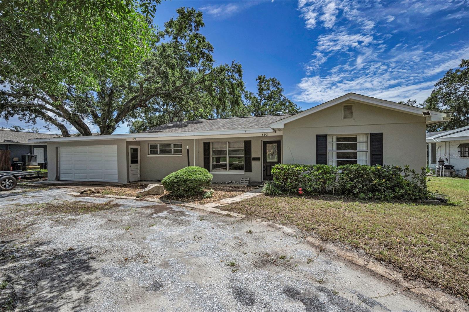 Auction Property. AUCTION! Sold free and clear of all liens. Listing price is the opening bid. Auction held live on site at the house SAT AUG 9th at 12pm. Welcome to this unique waterfront pool home nestled in the heart of Tarpon Springs, offering stunning views, coastal charm, and an exciting opportunity to restore and personalize a property in one of Florida’s most beloved Gulf Coast communities. This 4-bedroom, 2-bath home features an open-concept layout, and a spacious backyard with a private pool and spa overlooking the serene waters. Enjoy direct water access—ideal for boating, fishing, or simply taking in the sunsets from your own backyard. While the home sustained water intrusion, it presents a blank canvas for investors, builders, or end users ready to renovate and bring new life to this desirable waterfront location. Located just minutes from historic downtown Tarpon Springs, the Sponge Docks, local dining, beaches, and parks, this home offers both lifestyle and location.