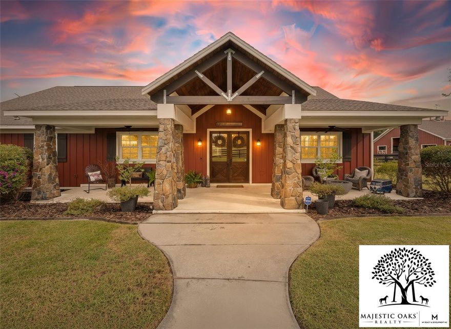 Discover the charming rolling hills of Weirsdale, Florida.
This stunning custom home sits just south of Ocala—The Horse Capital of the World—known for its world-class equestrian farms and facilities. Surrounded by beautiful lakes and the quaint towns of Mount Dora, Eustis, Tavares, and Leesburg, Weirsdale offers the perfect blend of rural beauty and convenience.

Located in a gated equestrian community, this dream property is only a short drive to the World Equestrian Center, less than 2 miles from Grand Oaks Equestrian Center, and borders the Ocala National Forest with its hundreds of miles of riding and hiking trails. Just 15 minutes away are the Marjorie Harris Carr Cross Florida Greenway and the Florida Horse Park, with even more preserves nearby—plus your very own trail right off the backyard. Ride straight out from your luxurious homestead near the Oklawaha River and the St. John’s River Preserve.

Situated on nearly 7 acres, this one-of-a-kind property invites you to bring the horses, bring the family, and bring the fun. Silver Springs, Salt Springs, and Rainbow Springs are all a short drive away, while both the Atlantic and Gulf beaches are about an hour. The open-concept layout makes this home an entertainer’s dream, perfectly located for endless adventures and outings.

And for your saddle-bird friends? They will LOVE the bunkhouse.
The fully insulated pole barn features A/C, heat, covered trailer parking, an outdoor shower, and a 50-amp RV hookup. Park your boat, RV, or horse trailer with ease. Open the large bay door for movie night overlooking the pasture—your horses included.

The property wraps gracefully around the cozy home, offering peaceful views of your animals from every window. Inside, you’ll find high-end finishes including a Generac 20KW whole-home generator, exceptional Thermador appliances, and a massive 13-foot island—the ideal gathering space for holidays and events.

All the conveniences of The Villages, shopping, medical facilities, and Ocala’s many events are close by, yet Weirsdale remains quiet, tucked away, and beautifully serene. Orlando, Universal Studios, and Disney are under 45 minutes away—an incredible amenity for residents and guests.

Whether you’re looking for a seasonal retreat or a full-time homestead for riding and country living, this property has it all.

You may never want to leave the incredible outdoor living space: a large stone gas fireplace, saltwater pool and spa, and a calming water feature that sets the mood for relaxation.
The barn is thoughtfully designed with 4 stalls, a feed room, tack room, and a huge workshop.

This is a must-see home—pictures simply cannot capture the magic and charm of experiencing it in person.