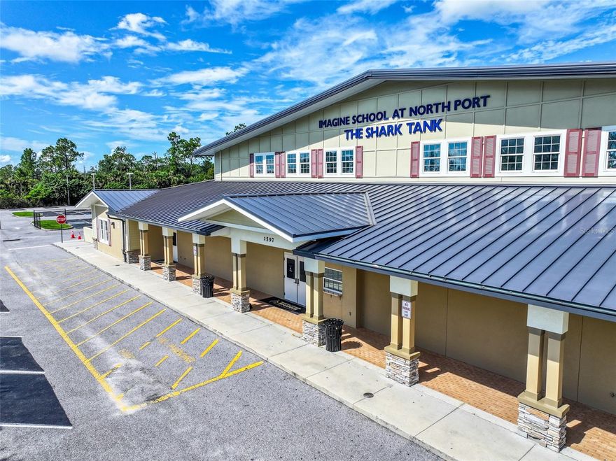 This multi-purpose sports facility, located in the rapidly growing city of North Port, offers 16,212 square feet of versatile space suitable for a wide range of uses. The main entrance opens into a full-sized basketball/volleyball court featuring hardwood floors, roll-out bleachers, ceiling-suspended folding basketball goals, and an electronic scoreboard.

Adjacent to the court are multiple rooms currently used as a weight room, classrooms, and locker rooms, providing additional flexibility for a variety of activities.

The property is highly visible from both Toledo Blade Boulevard and Sycamore Street. It sits on a fenced lot with ample parking and convenient accessibility, with the main entrance positioned directly off the roadway for improved traffic flow.

Zoned for Activity Center use, the property allows for a wide range of possibilities, including a church, school, sports facility, craft brewery, food hall, and more.