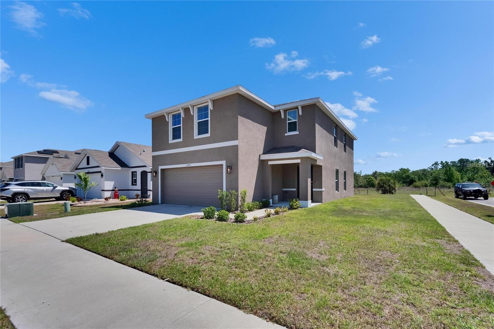 Welcome home to this beautifully cornered lot and no backyard neighbors. This 4-bedroom, 2.5-bathroom residence in the sought-after Creek Preserve subdivision is professionally managed. Featuring an open floor plan, this home offers a seamless flow between the kitchen, family room, and dining areas all tile—perfect for modern living. Upstairs while the bedrooms are comfortably carpeted. The kitchen offers beautiful brown cabinets and gorgeous granite countertops, and stainless steel appliances, all overlooking the spacious family room. The bedrooms are all upstairs. This retreat includes a large walk-in closet and an en-suite bathroom with dual sinks and a walk-in shower. A separate laundry room adds to the home’s convenience. Great loft area as you go up the stairs. Step outside to a covered patio, perfect for relaxing and enjoying the good-sized backyard that backs up to a peaceful cow pasture—your only rear neighbors will "mooooove" you! Lawn service is not included. Located in a growing community with great amenities, this home is close to shopping, dining, and major roadways for easy commuting. Don’t miss out—schedule your showing today! The lease must start within 2 weeks of application approval. This property is also for sale. If rented it will come off the market for sale.