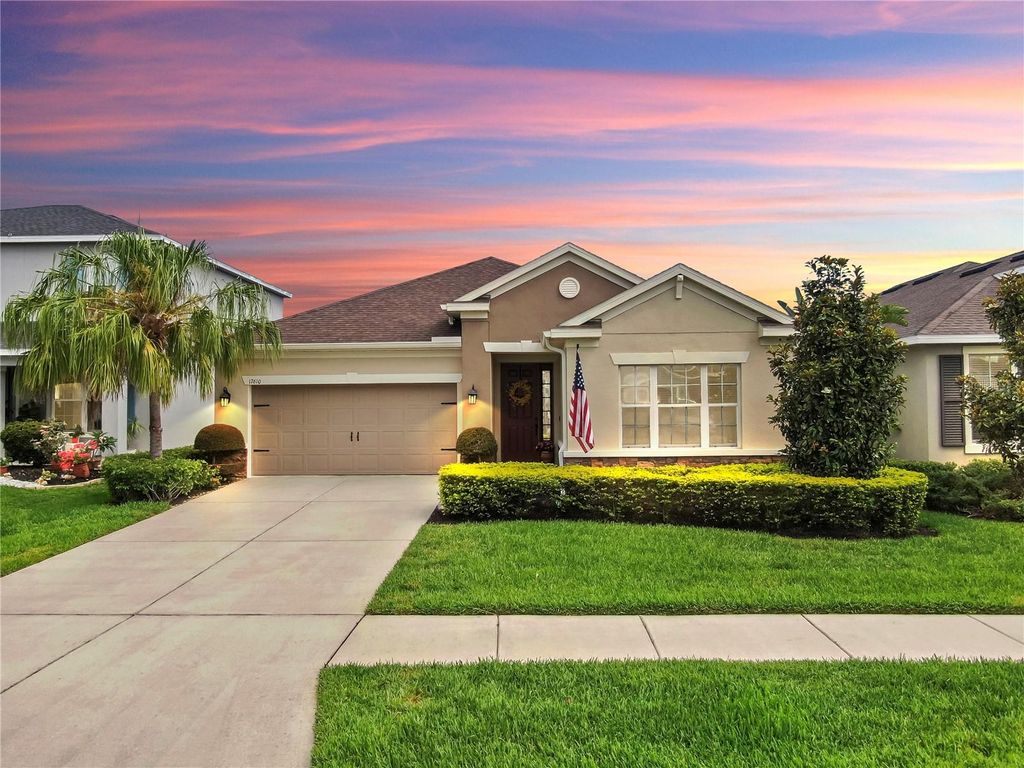 Photo of 17610 Buckingham Garden Drive, Lithia, FL 33547 (MLS # TB8389639)