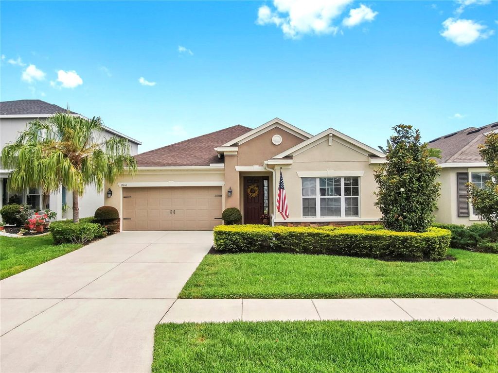 Photo of 17610 Buckingham Garden Drive, Lithia, FL 33547 (MLS # TB8389639)