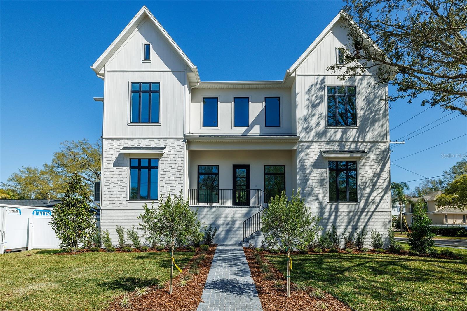 Stunning Custom-Built 2024 Milana Home – 5 Beds, 5 Baths, Private Pool & Spa! Experience luxury living at its finest in this newly built 5-bedroom, 5 full baths + 2 half baths two-story home by Milana Custom Homes. Designed with exquisite detail and high-end finishes, this home offers both elegance and comfort for the most discerning renter. Main Floor Highlights:
Enter through a grand open foyer into a spacious great room with a cozy fireplace, perfect for entertaining. The gourmet kitchen features a large island, quartz countertops, gas range, range hood, microwave, and dishwasher. Adjacent is a temperature-controlled wine room and an elegant dining space. The first-floor primary suite includes a spa-like en-suite bath and generous walk-in closet. Step out onto the 1st-floor balcony with an outdoor kitchen overlooking the private pool, spa, and stunning linear fire feature. Second Floor Luxury: A sweeping staircase leads to four additional bedrooms, each with their own en-suite baths and walk-in closets. Also, a laundry room equipped with washer dryer hook ups, sink and surrounding cabinets is located on the 2nd floor. A spacious bonus/media room offers the perfect spot for movies and game nights. Enjoy serene views of the backyard from the second-floor balcony. Detached 3-car garage with an additional door for golf cart and bike storage. This home blends luxury with functionality, offering the perfect retreat in a great location. Just off Westshore S and San Miguel for easy access to I-275 S, Tampa International Airport, S Kennedy Blvd and Gandy Blvd.