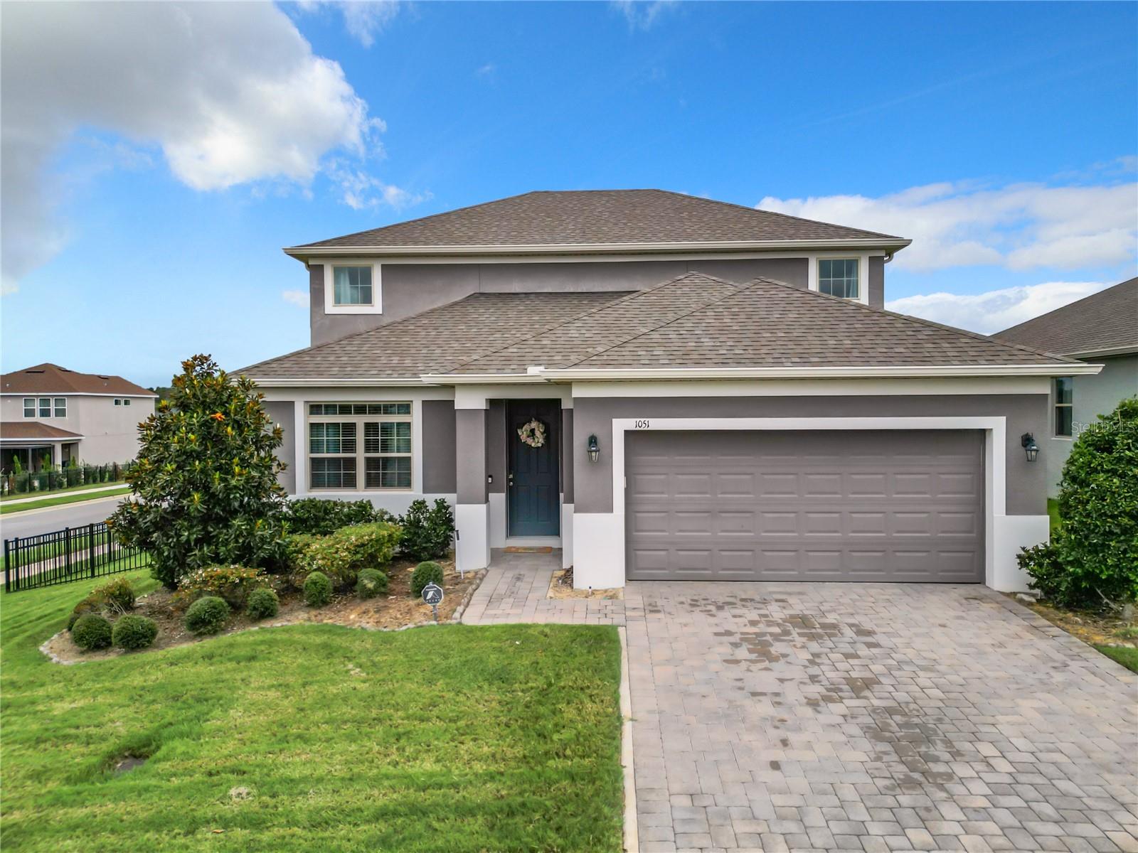 Welcome to this beautiful 4-bedroom home, ready for its next owners! Step inside to a welcoming foyer with a formal dining room just off to the left. The kitchen opens seamlessly to the living room, creating the perfect space for gatherings and entertaining. The primary suite is thoughtfully located on the first floor, offering a private retreat separate from the additional bedrooms. Upstairs, you’ll find a spacious loft—ideal for game nights, movie marathons, or a cozy lounge space—along with three bedrooms and a full guest bath. Outside, enjoy the expansive fenced backyard, perfect for play, pets, or simply relaxing outdoors. Highland Ranch is a sought-after community featuring a pool, splash pad, playground, basketball courts, and scenic walking trails. Its prime location offers quick access to the turnpike, downtown Clermont, waterfront parks, theme parks, shopping, dining, and more. Don’t miss the chance to make this home yours—schedule your private tour today!