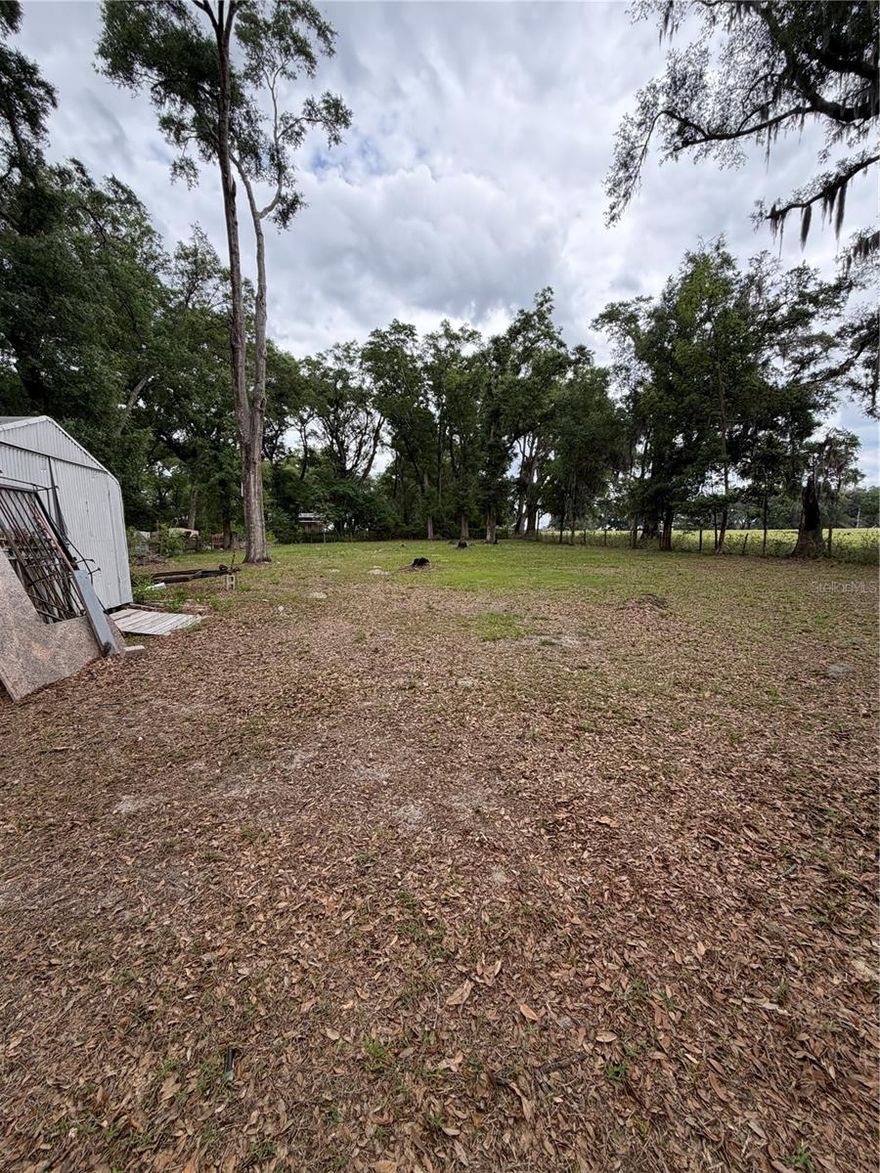 .70 ACRE LOT IS READY FOR A MOBILE HOME OR A NEW BUILD.  SITUATED AT THE END OF A DEAD END ROAD AND BACKING UP TO A LARGE PASUTRE.  PARTIALLY CLEARED WITH A HABITAL 900 SQ FT MOBILE.  YOU CAN BRING IN A NEWER MOBILE HOME OR BUILD A NEW HOME ON THIS LOT.  THE SELLER HAS HAD A NEW WELL INSTALLED WITH A HIGH VOLUME WELL PUMP, REPLACED THE ELECTRICAL BOX AND ELECTRICAL WIRING TO THE PROPERTY AND REPLACED THE ENTIRE SEPTIC SYSTEM WITH A BRAND NEW TANK AND LEACH FIELD ALL WITHIN THE PAST 3 YEARS. IF YOU ARE LOOKING FOR A NICE PEICE OF LAND THIS COULD BE THE ONE!