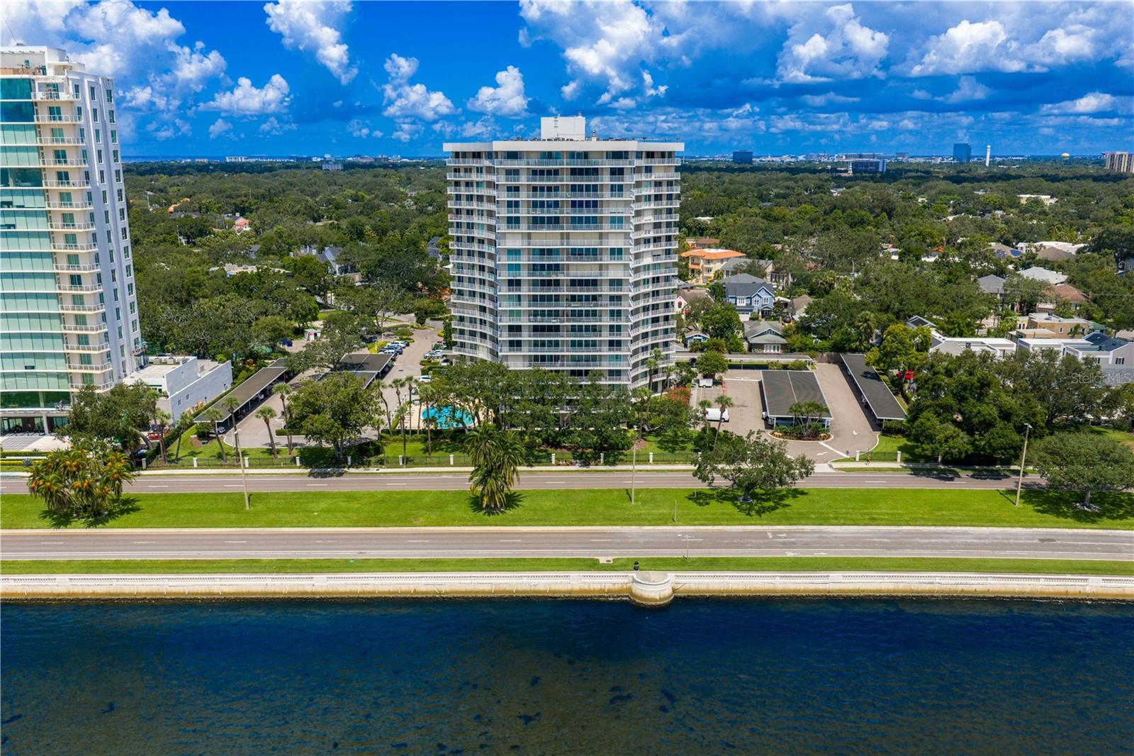Don't miss this incredible value at The Bayshore Diplomat! Priced to sell, this lovely two bedroom and two bathroom condo features comfortable living spaces, a split floorplan, and effortless SW views across Bayshore Blvd. and the Hillsborough Bay! The kitchen has been updated, with newer appliances and granite countertops. Both bedrooms offer Bayshore views, space to move, and walk-in closets. Amenities include a 24-hour concierge, fill-time building management, tennis courts, pool, community room, and more. Accessibility to the best of South Tampa is a breeze, and speaking of breezes, open the sliding doors with HURRICANE SHUTTERS and enjoy the lovely breeze while sipping your favorite drink or go for a walk on the Bayshore. Welcome home!