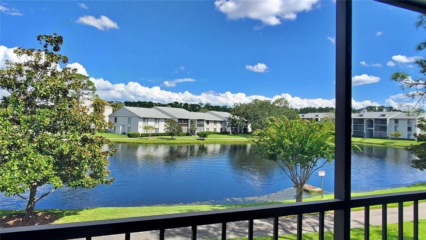 Waterfront End Unit Condo with Panoramic Views Under $200K! • Gated Community of Pine Ridge Club Village • Turn-key with Furnished Option • Living Room Opens to a Screened Balcony Overlooking the Water • All Rooms Have a Tranquil Water View!! • Fully Equipped Kitchen with Breakfast Bar • 2 Spacious Bedrooms and 2 Full Baths • Master Bedroom Features Water views and End Unit Side Window for an Open Airy Feel • Simplify Living with TV Cable, internet, water and sewer, building and ground maintenance included in monthly Condo Fee • Pool, Tennis/Pickleball Courts • No Upcoming Special Assessments • One Pet Up to 25 lbs • Flood Zone X! • Concrete Block Building • Designated Parking Space • Inside Laundry