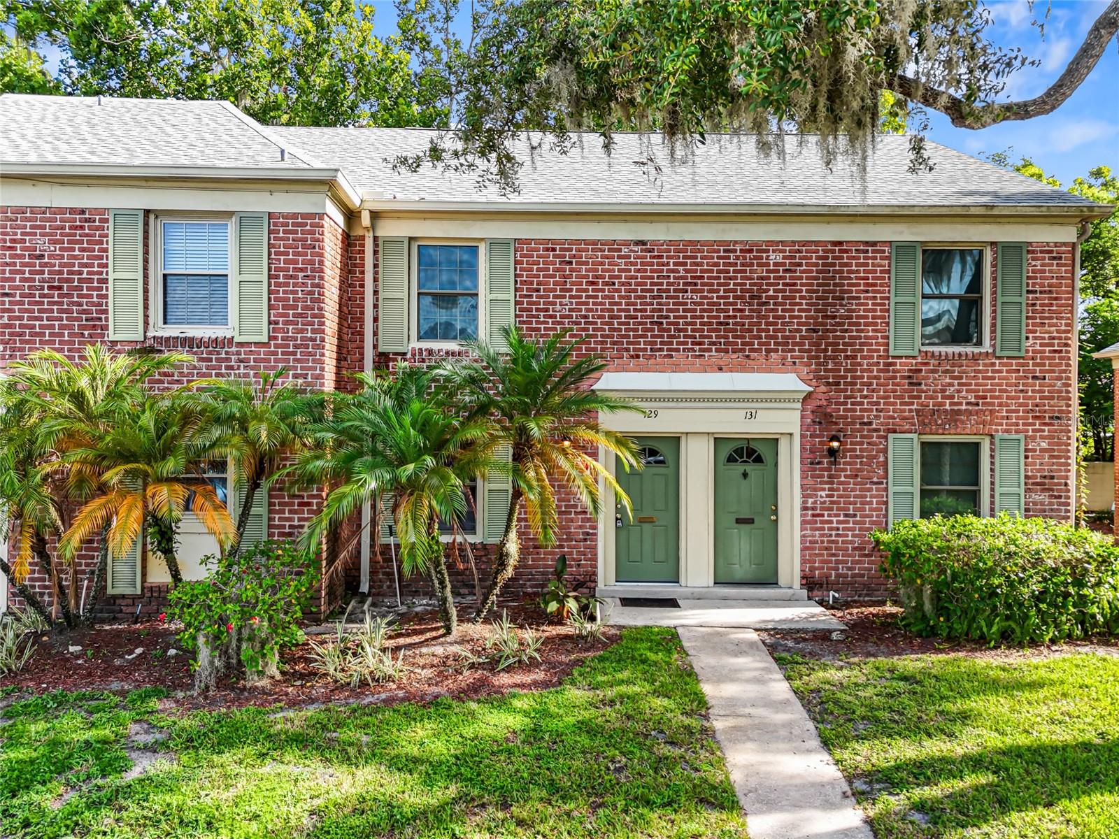 Welcome home to this updated 2-story townhouse in a beautiful lakefront community! Freshly painted interior and a remodeled bathroom add a modern touch to this move-in-ready home. Enjoy easy-care wood laminate and tile flooring throughout—no carpet! The kitchen features a range, microwave, dishwasher, garbage disposal, and a cozy eating space. Sliding glass doors from the living area lead to a brand-new paver patio—perfect for relaxing or entertaining. Upstairs, the spacious primary bedroom has sliding doors to a wooden deck with peaceful outdoor views. Additional features include a stackable washer/dryer (included) and 1 assigned parking spot. Community amenities include a sparkling lakefront pool, clubhouse, and boat dock. Water & trash is included in the rent. Sorry, no pets and no commercial vehicles permitted.
